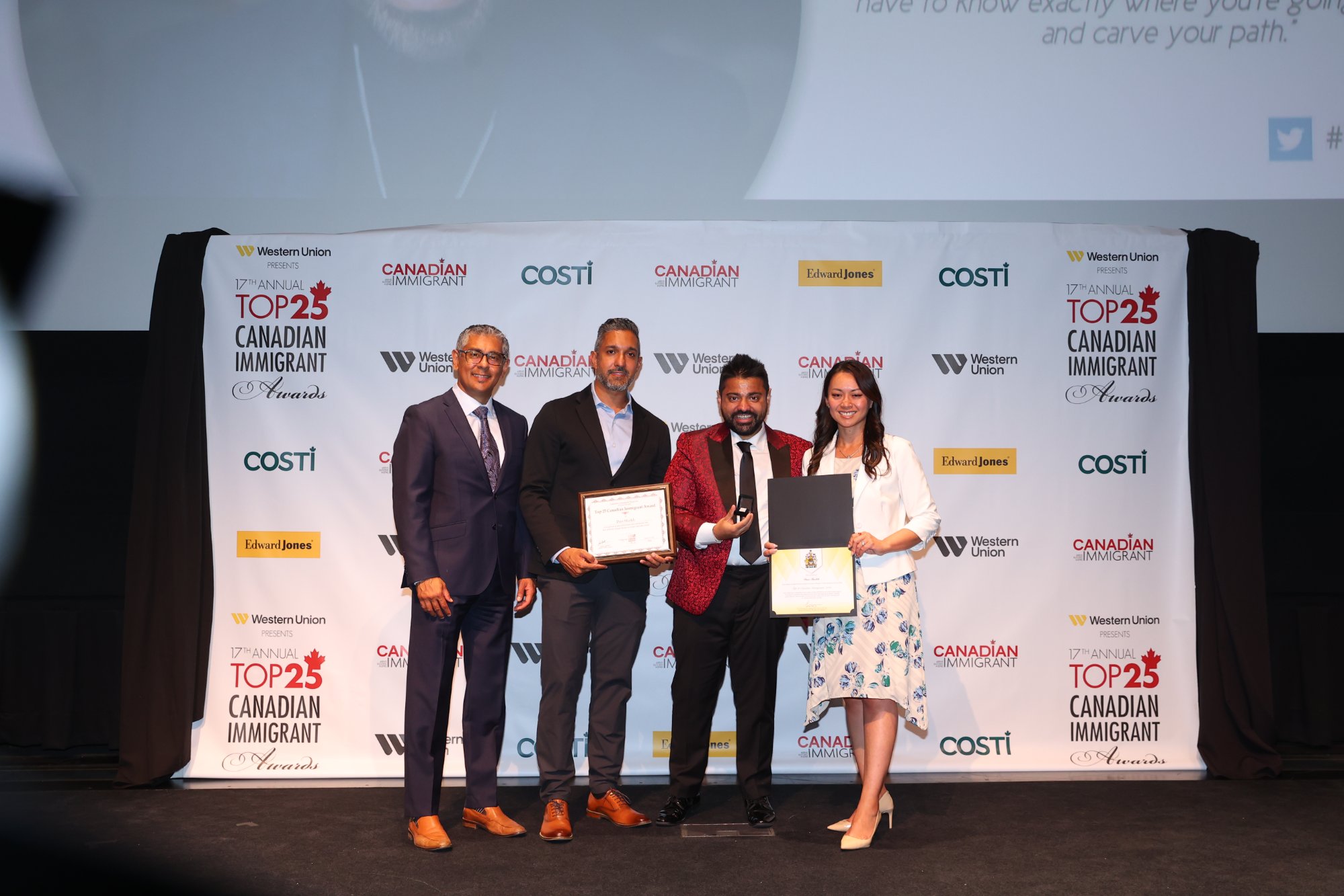 Dan Shaikh receiving the Top 25 Canadian Immigrant Award